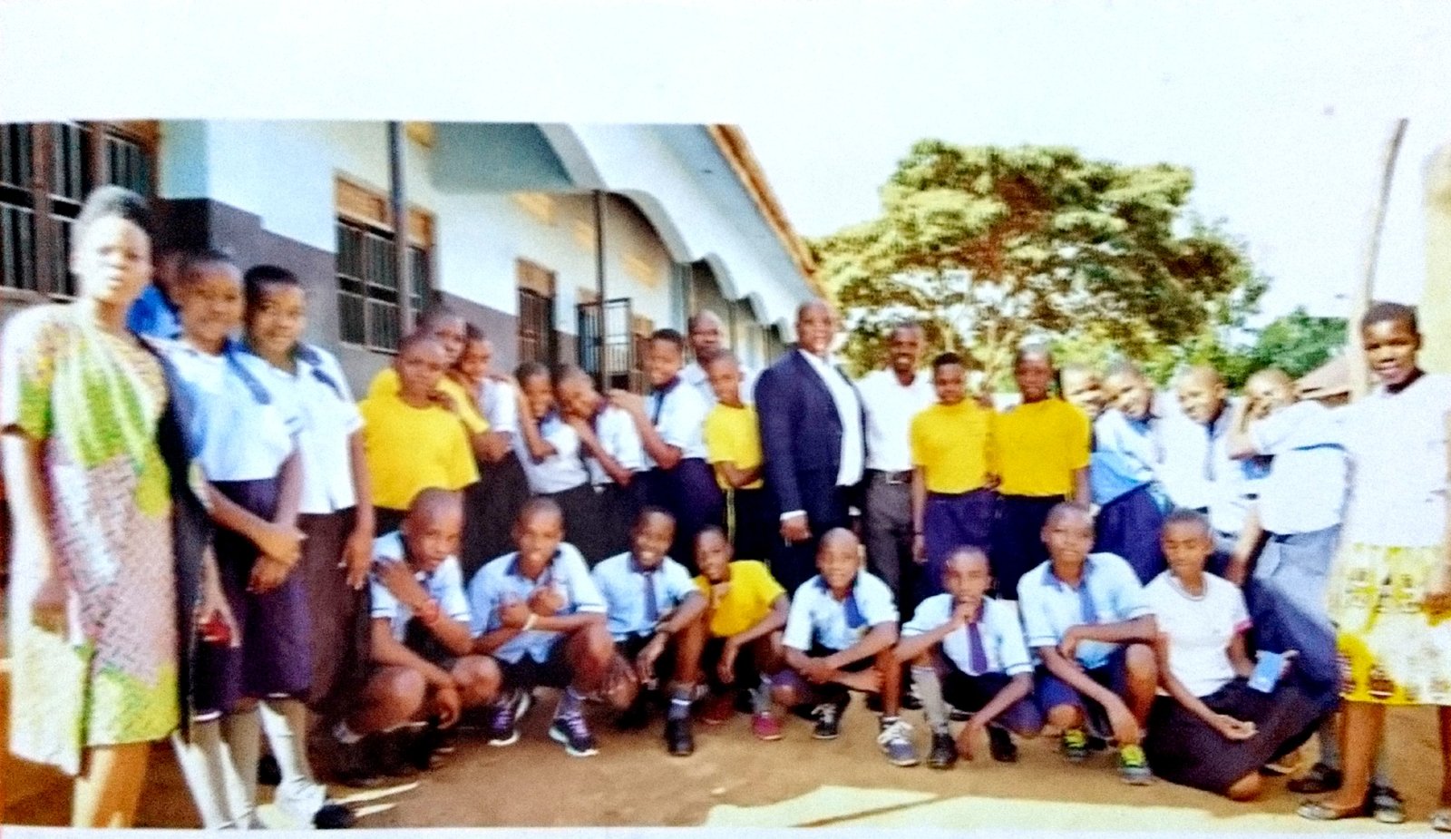 Some of the old students posing for a photo